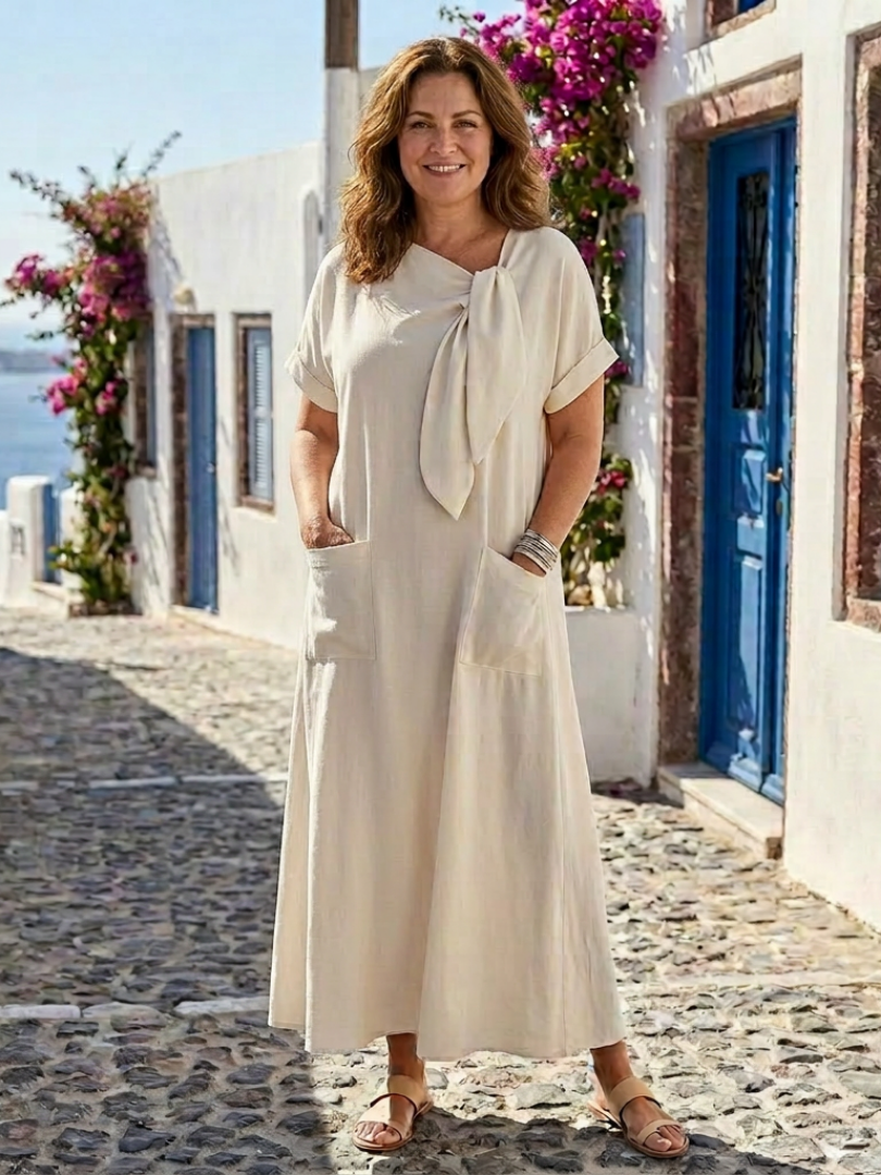 Elowyn | Maxi dress with round neck and short sleeves with pockets